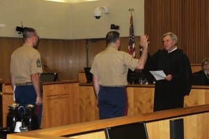 John Thomas takes the oath and is promoted to Major